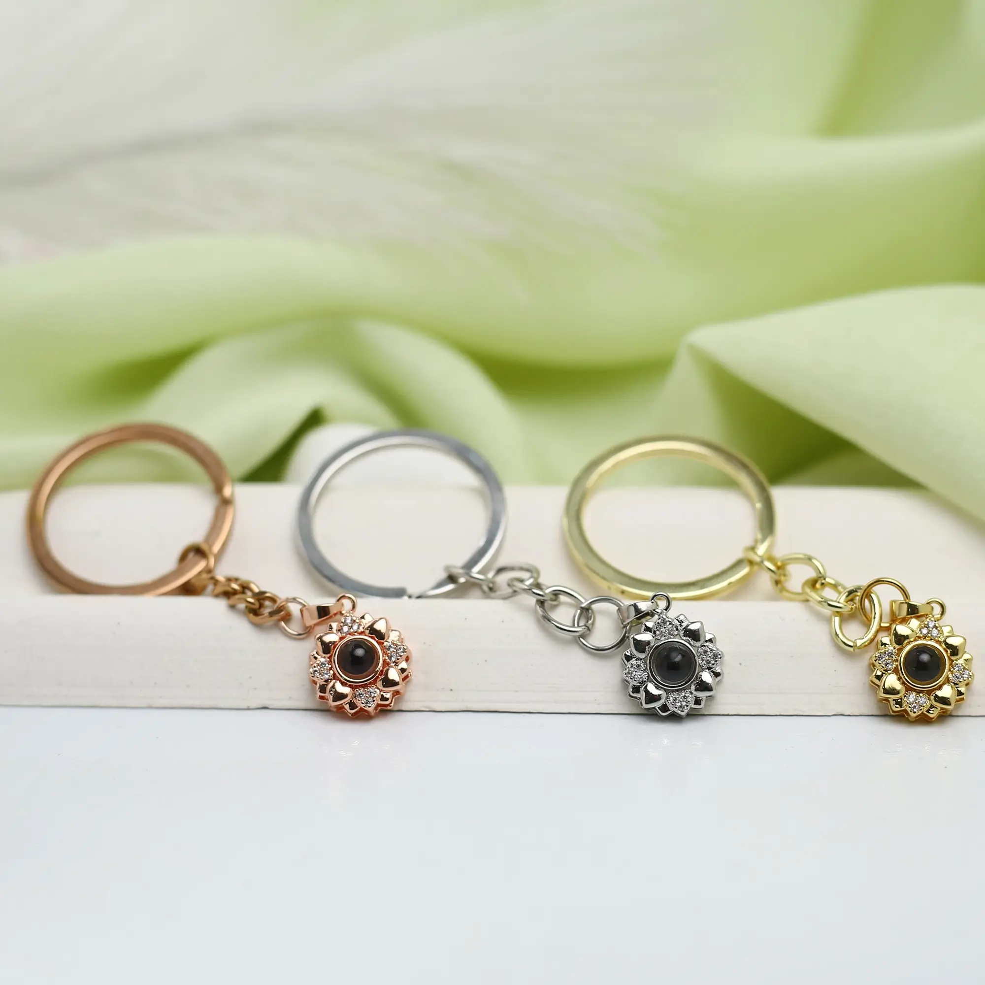 anniversary bloom photo keychain Elegant bloom projection keychain with hidden photo, a personalized jewelry gift for special occasions.