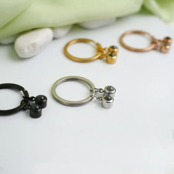 Custom double pendant keychain featuring two secret photos, perfect for family or couples.