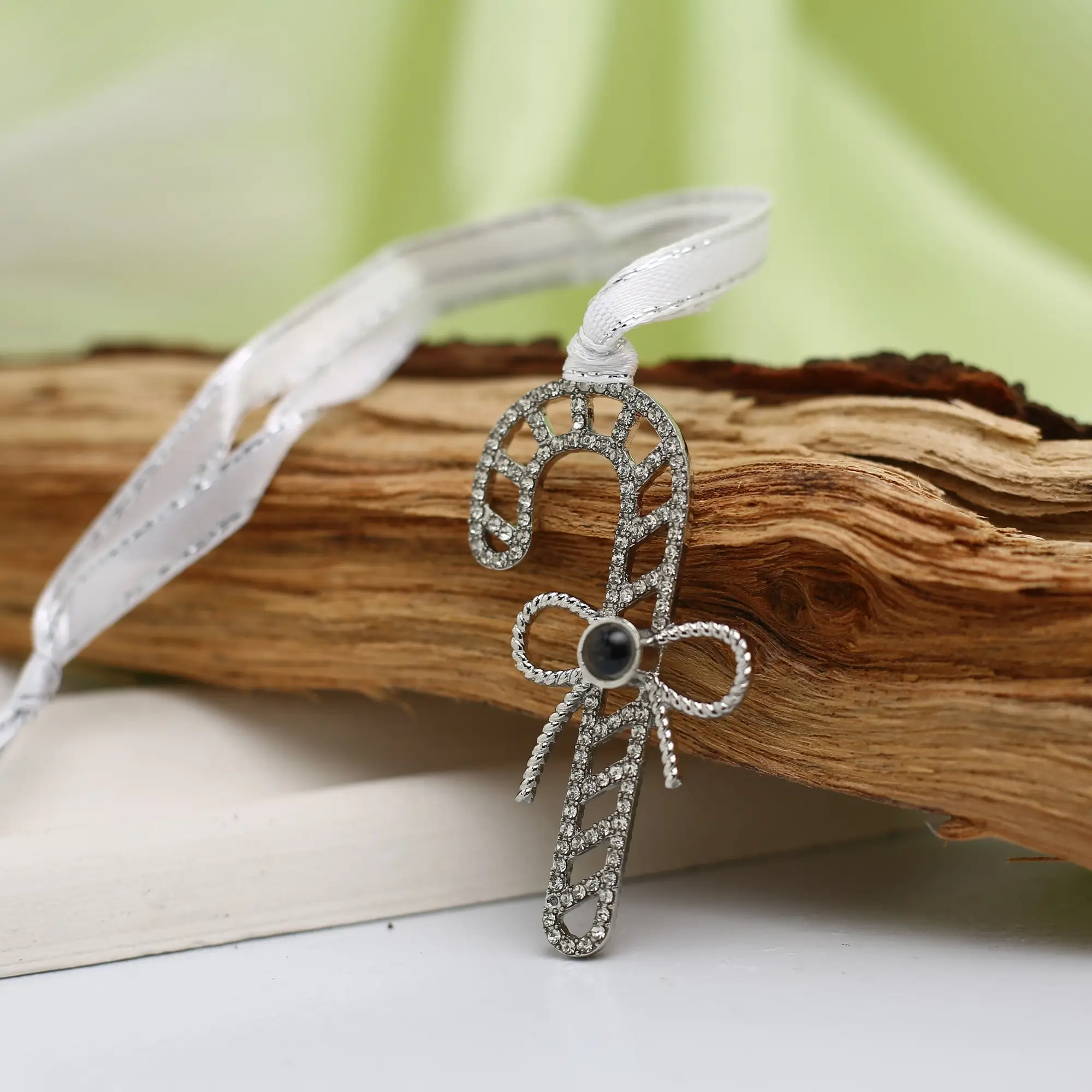 candy cane photo ornament Personalized candy cane ornament with hidden image, a sweet and meaningful Christmas tree decoration.