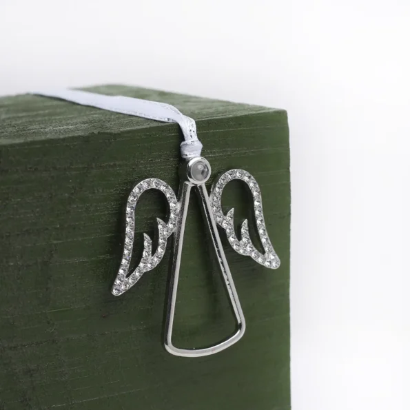 Custom angel-shaped ornament with hidden photo projection inside, perfect Christmas remembrance gift.