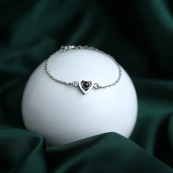 Love keepsake bracelet with hidden heart photo inside, a meaningful personalized gift.