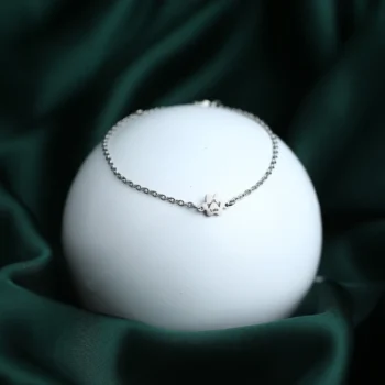 Paw print bracelet with engraved name, a meaningful gift for pet lovers and remembrance.