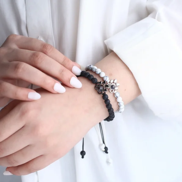 Frosted bead bracelet with paw charm and hidden photo projection, memorial gift.
