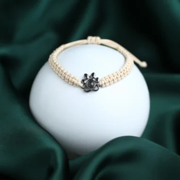 Personalized paw memory braided bracelet with hidden photo inside, memorial keepsake jewelry.