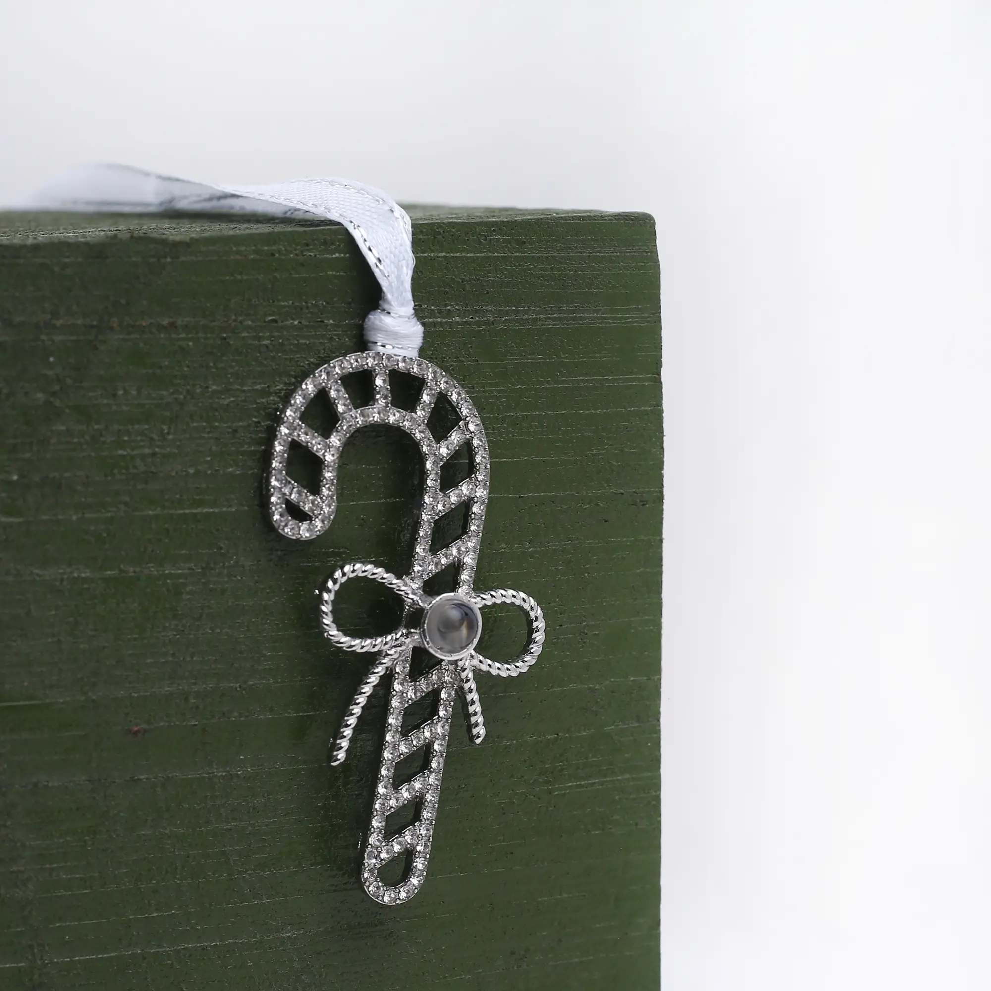 hidden picture candy cane ornament Holiday candy cane keepsake ornament with hidden photo, perfect for remembering special moments.