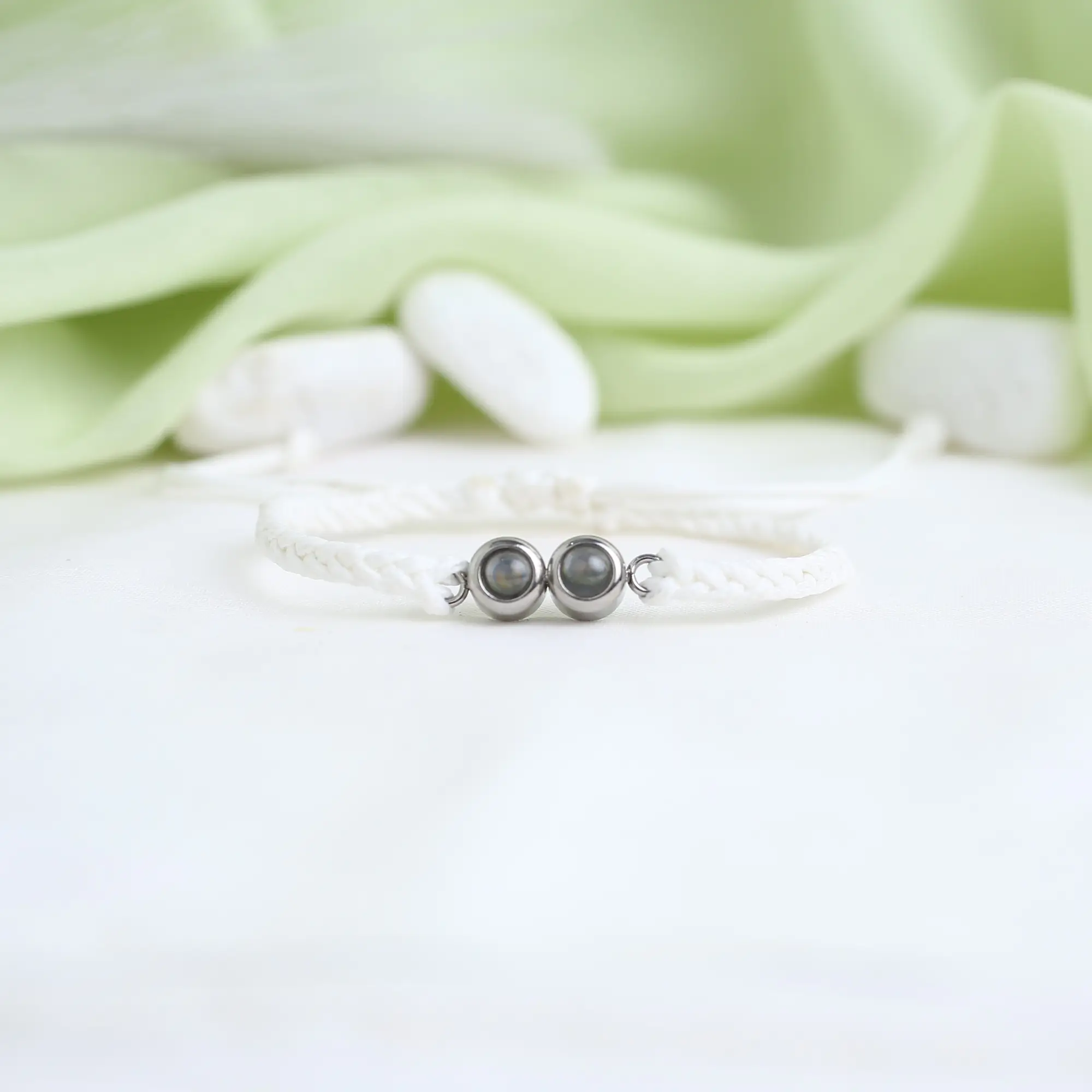 hidden projection duo photo bracelet Custom bead bracelet with two hidden photos, keepsake of cherished moments.