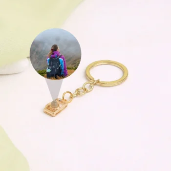 Custom camera photo keychain with hidden image, a special birthday gift idea.