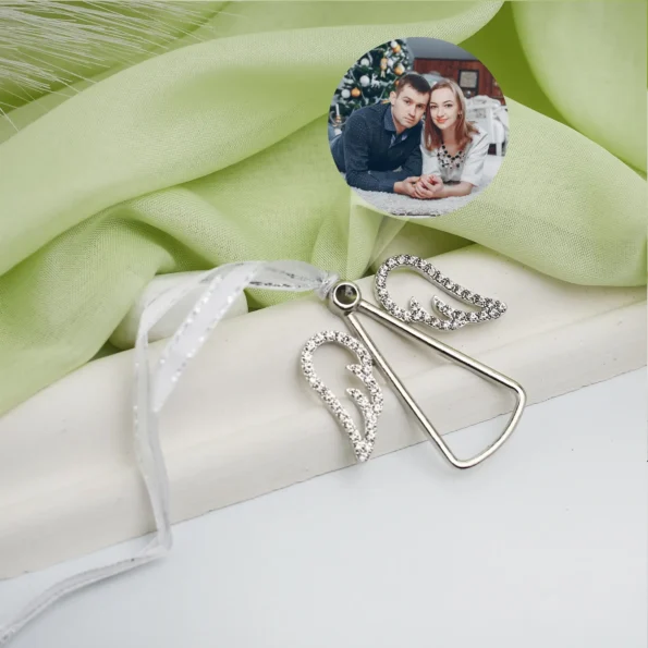 Personalized memorial angel ornament with projection photo, thoughtful tribute decoration for tree.