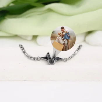 Elegant origami crane bracelet with secret projection picture, a unique custom gift.