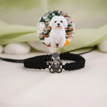 Paw memory bracelet with braided design and secret photo inside, memorial jewelry.