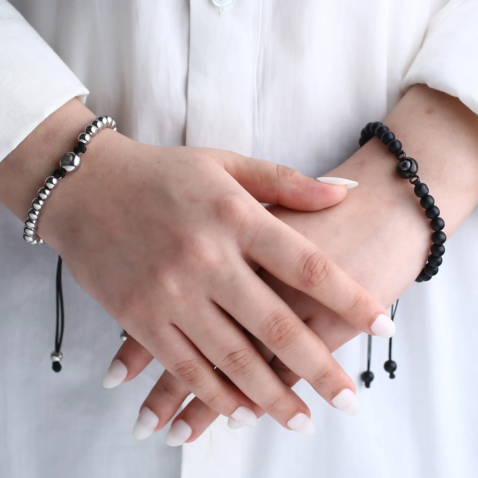sentimental beaded cord photo bracelet Beaded cord bracelet with hidden photo inside, a meaningful personalized keepsake.