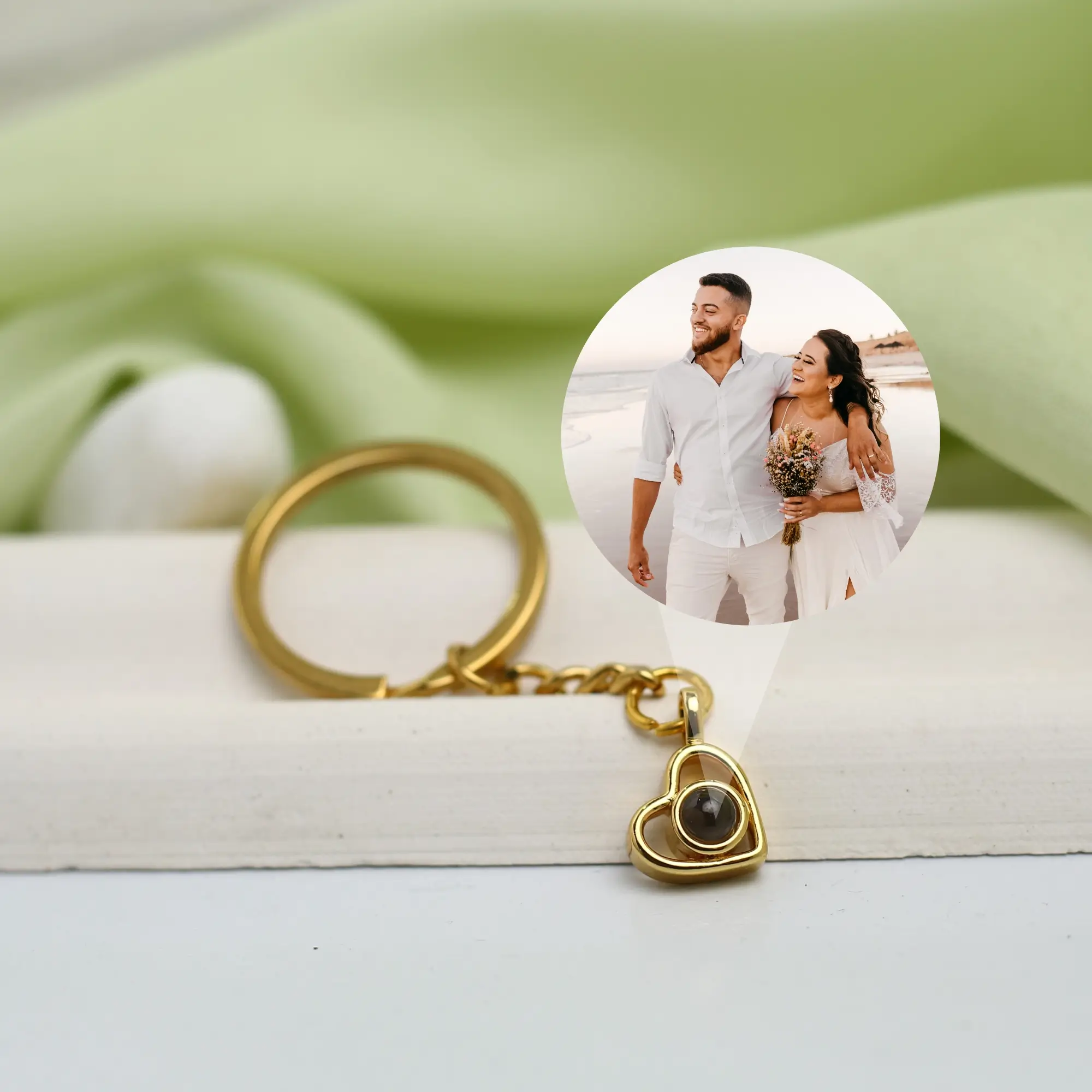 sentimental heart projection keychain Heart-shaped projection keychain with hidden photo inside, a meaningful personalized keepsake.