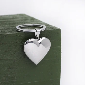 Elegant love heart keychain with engraved photo inside, a personalized jewelry gift.