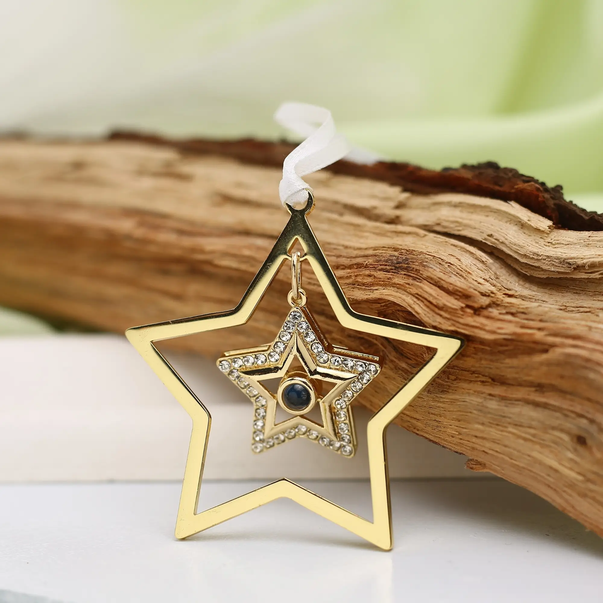 star photo projection ornament Star photo projection ornament designed to hold a special picture, ideal for remembrance or holiday celebration.