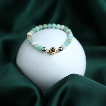 Orb stone bracelet with secret photo inside, unique personalized jewelry.