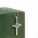 faith cross pendant with hidden projection photo