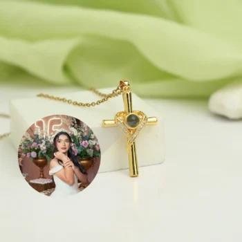 Cross projection necklace with hidden image inside, representing faith, hope, and cherished memories.