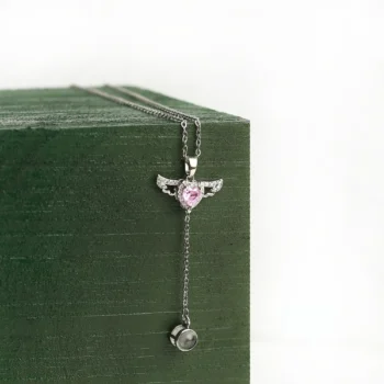 Faith-inspired angel pendant with hidden photo inside, a personalized gift symbolizing light, memory, and protection.
