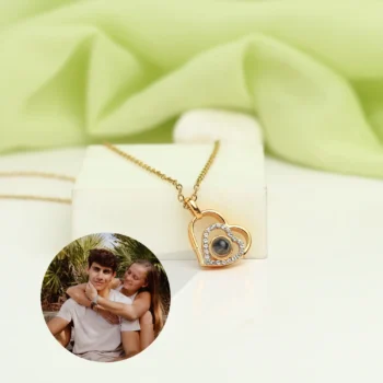 Sparkling heart pendant revealing a secret photo through light, crafted as a sentimental gift full of emotion.