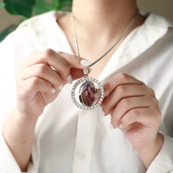 Elegant spinning pendant for her with custom photos on both sides, a heartfelt personalized gift.