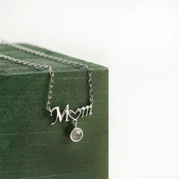 Custom mom heart pendant revealing a secret photo projection, a touching keepsake for Mother’s Day or family memories.
