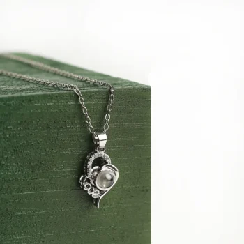 Forever Love necklace with hidden projection image inside, representing unity, memory, and everlasting affection.
