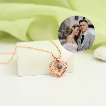 Hidden picture guardian heart pendant with elegant wings, a keepsake that protects precious memories close to the heart.