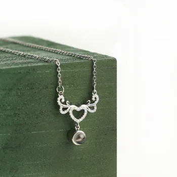 Custom friendship heart pendant featuring a hidden photo projection, a timeless reminder of care and connection.
