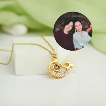 Wave-shaped necklace with hidden projection image inside, representing serenity, emotion, and the rhythm of love.