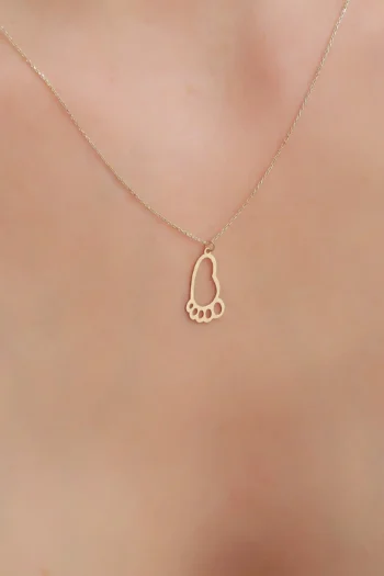 14K Solid Gold Footprint Necklace – Meaningful Footprint PendantCelebrate life's most precious moments with our 14K Solid Gold Footprint Necklace, expertly handcrafted from genuine 14K Solid Gold. Featuring a delicate footprint pendant, this meaningful necklace symbolises love, family, new beginnings, and cherished memories, making it a timeless keepsake.  Its minimalist design and polished finish create an elegant look that is perfect for everyday wear. Whether worn as a symbol of a child, a loved one, or a special milestone, this beautiful necklace is a heartfelt addition to any jewellery collection and layers effortlessly with your favourite pieces.  Crafted from genuine 14K Solid Gold, this necklace offers exceptional quality, lasting beauty, and comfortable everyday wear. It makes a thoughtful gift for new mums, baby showers, birthdays, Mother's Day, anniversaries, or someone special.  Beautifully presented in a premium jewellery gift box, this elegant footprint necklace is designed to be treasured for years to come.  Product Details  Genuine 14K Solid Gold Footprint pendant design High-polish finish Chain shown in photo: 18" Lightweight and comfortable for everyday wear Hypoallergenic Perfect for layering or wearing alone Suitable for everyday wear and special occasions Presented in a premium jewellery gift box Gift wrapping available